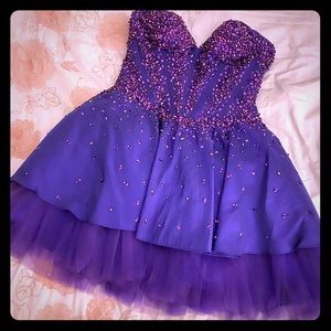 Dark purple, beaded strapless mini dress.